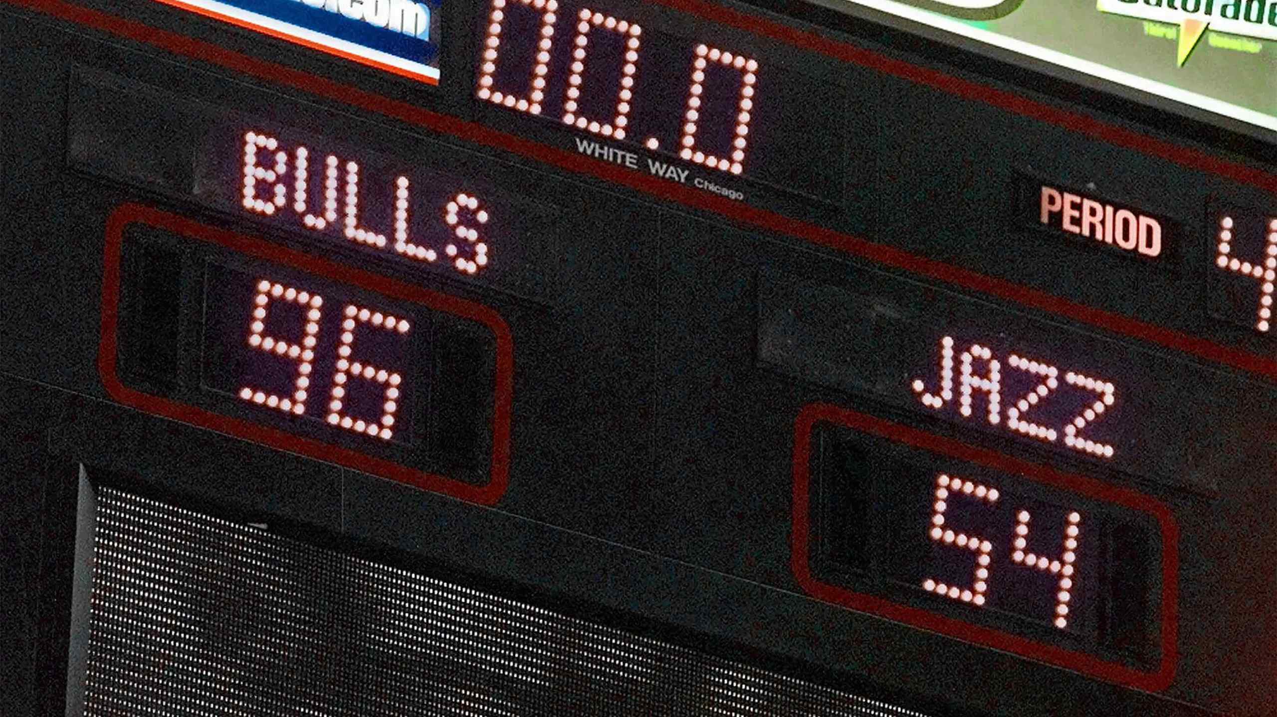 An NBA scoreboard with Bulls and Jazz.